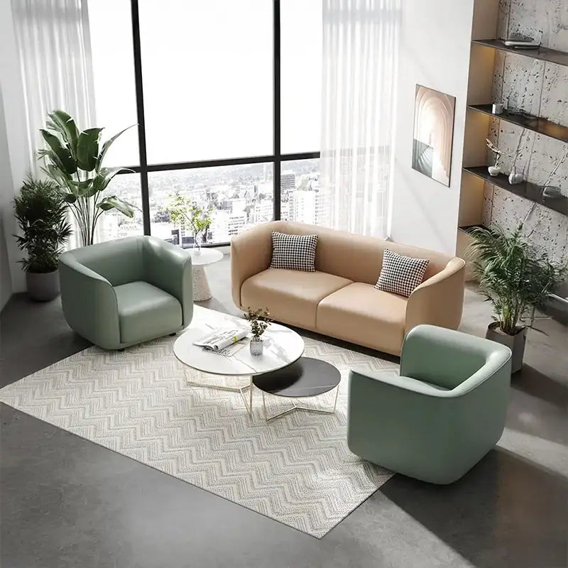 Curved sofa with soft rounded arms and low wraparound backrest, leg and base detail