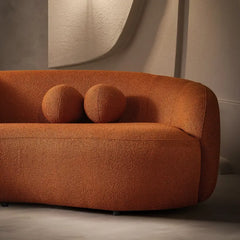 Luxury sofa with deep lounge seating and rounded arms, wide-angle seating view