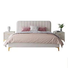 low profile platform bed shown in a spacious bed layout with rounded padded edges alternate front angle