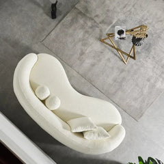 Luxury sofa with deep lounge seating and rounded arms, lounger configuration view