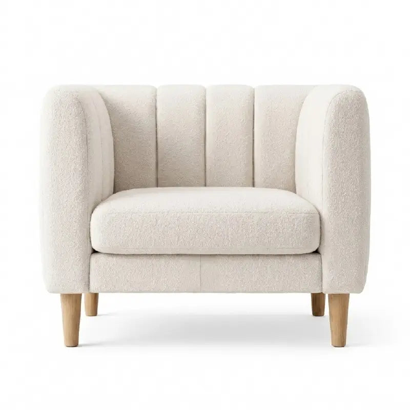 leatherette sofa with vertical stitched cushions and structured back support, wide room view