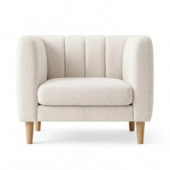 leatherette sofa with vertical stitched cushions and structured back support, wide room view
