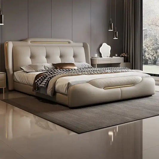 bed with tufted headboard shown in a spacious bed layout with deep button-padded headboard