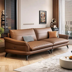 Leatherette sofa set with deep cushions and curved padded arms, front three-quarter view
