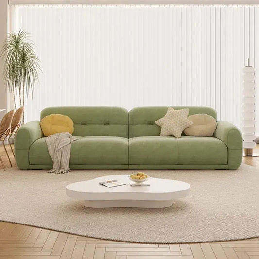sofa set online with rounded arms, plush cushions and muted green fabric in a straight layout