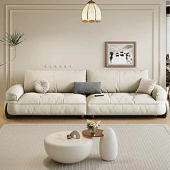 plush sofa set with loose tall back cushions with soft support, three-quarter view