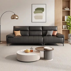 Leatherette sofa with deep cushions and segmented back support, straight front view