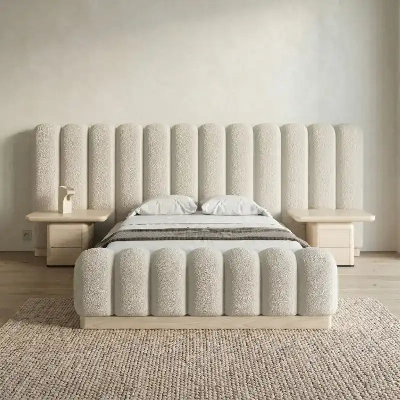 boucle bed shown in a spacious bed layout with soft textured fabric