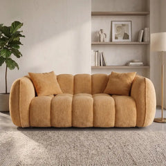 boucle sofa with rounded armrests with integrated plush cushioning, side profile