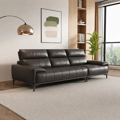 Leatherette sofa with deep cushions and segmented back support, right-side view