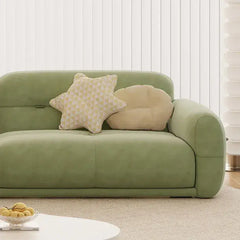 sofa set online with panel-stitched seats, pillow arms and a wide four seater arrangement