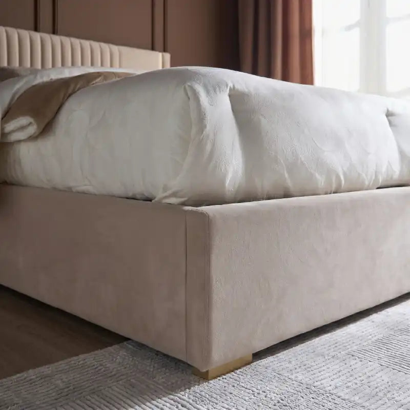 upholstered bed with headboard shown in a spacious bed layout with soft padded headboard alternate front angle