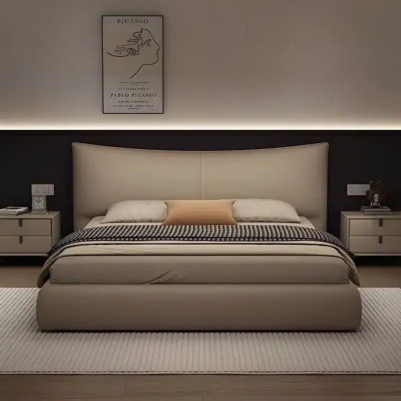 minimalist platform bed showing the lift-up storage area with curved padded headboard