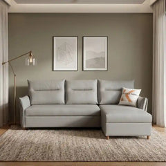 compact sofa bed opened as a guest sleeping surface with high back support