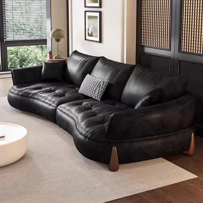 Top angle view of Sablon leather sofa set with leather couch upholstery, luxury sofa appeal, sculpted wave profile, designer couch elegance and contemporary sofa design details