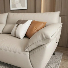 leatherette sofa set with cushion and upholstery seam close-up, backrest detail