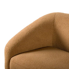 Fabric sofa with thick rounded arms and natural wooden legs, close-up of back cushions