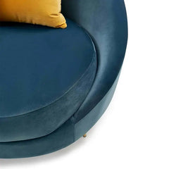Luxury sofa set with curved backrest and gold-finish legs, upholstery texture detail