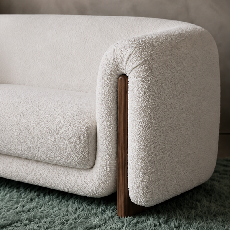 Modern 3 seater fabric sofa in premium upholstery installed in apartment living room in HSR Layout