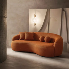 Lounge sofa with deep lounge seating and rounded arms, leg and base detail