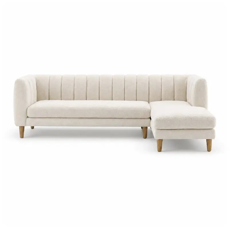 leatherette sofa with rounded arms and tapered wooden legs, support detail