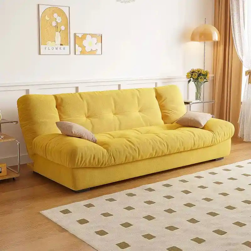 click clack sofa bed shown in the pull-out sleeping position with fold-down padded backrest alternate front angle