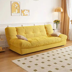 click clack sofa bed shown in the pull-out sleeping position with fold-down padded backrest alternate front angle