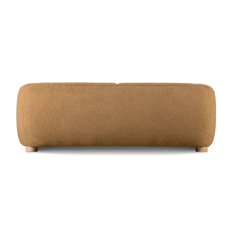 Boucle sofa with thick rounded arms and natural wooden legs, top-angle perspective