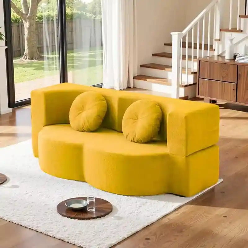sofa bed folding shown in the pull-out sleeping position with textured fabric alternate front angle