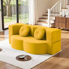 sofa bed folding shown in the pull-out sleeping position with textured fabric alternate front angle