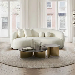 Lounge sofa with deep lounge seating and rounded arms, corner seating perspective