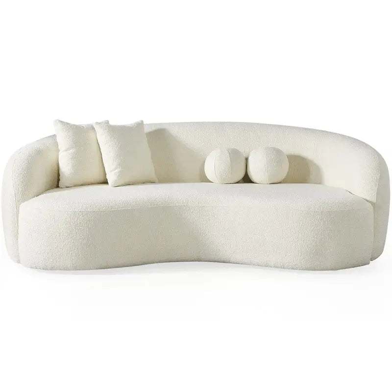 Lounge sofa with deep lounge seating and rounded arms, backrest support detail