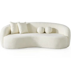 Lounge sofa with deep lounge seating and rounded arms, backrest support detail