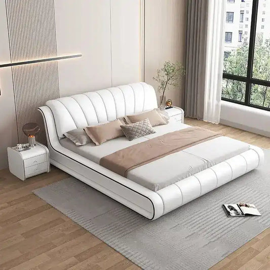 platform bed showing the lift-up storage area with curved padded headboard