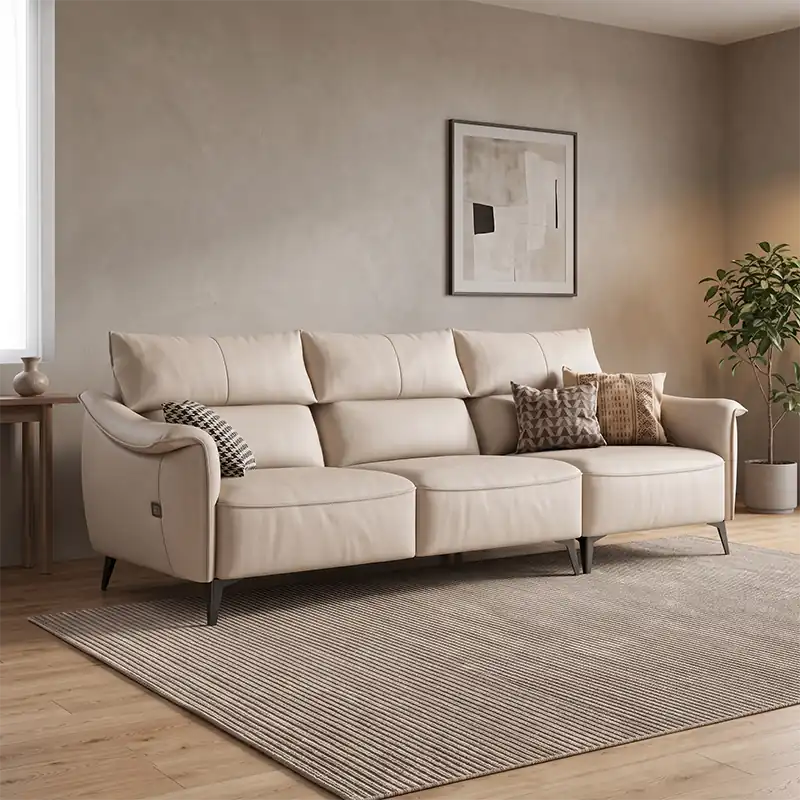 sectional sofa with extended lounger layout and padded cushioned arms, front perspective
