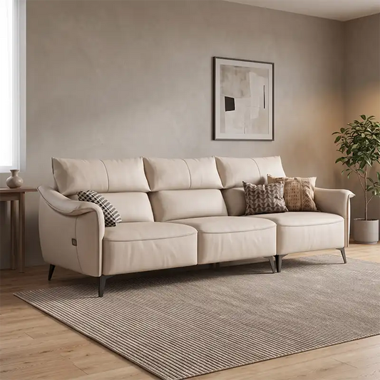 sectional sofa with extended lounger layout and padded cushioned arms, front perspective