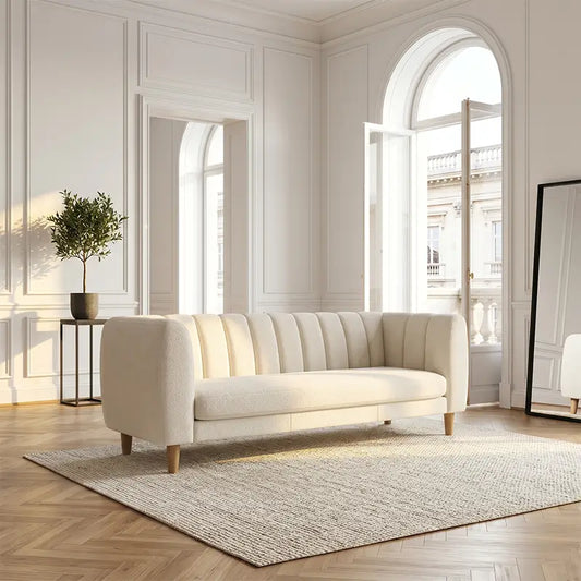 leatherette sofa with vertical stitched cushions and structured back support, front perspective