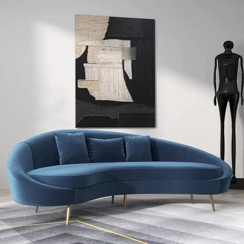 Luxury sofa set with curved backrest and gold-finish legs, front three-quarter view