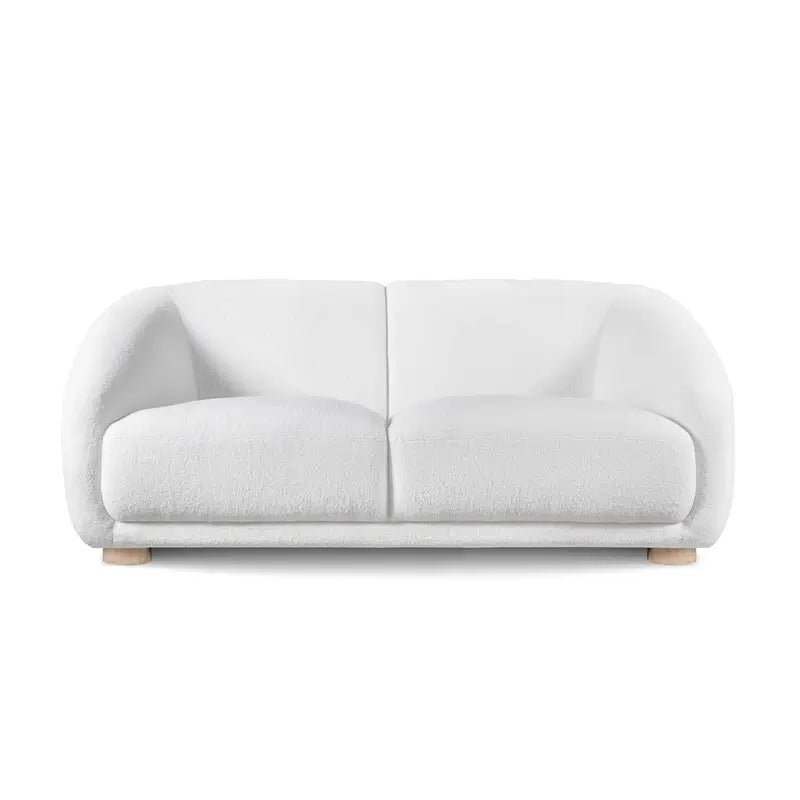 Fabric sofa with thick rounded arms and natural wooden legs, room-setting perspective