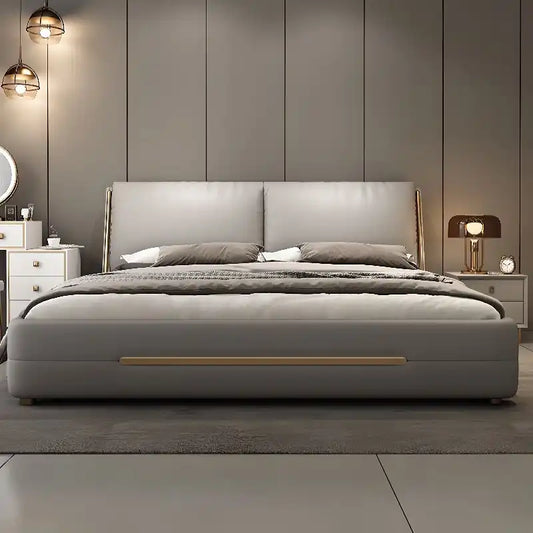 storage bed shown in a spacious bed layout with thick padded headboard