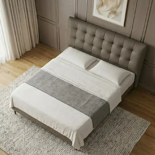 bed with tufted headboard side view showing the upholstered frame and legs with button-padded headboard