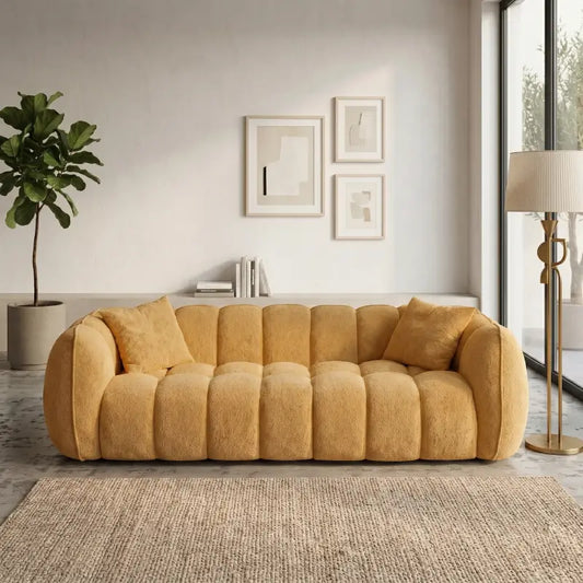 3 seater fabric sofa with vertical stitched cushions across the back and arms, three-quarter view