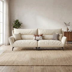 Fabric sofa with soft curved arms and slim metal legs, straight front view