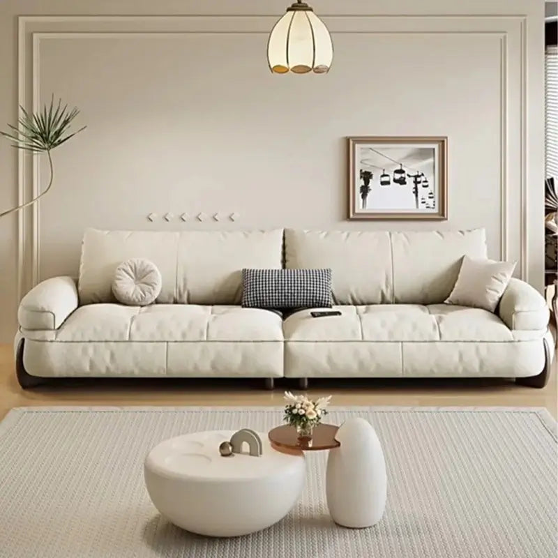 plush sofa set with loose tall back cushions with soft support, three-quarter view