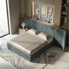bed with headboard shown with a balanced mattress layout with vertical padded panels alternate front angle