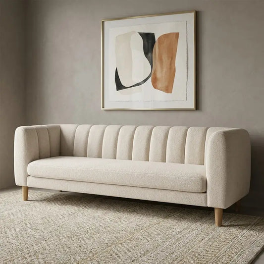 leatherette sofa set with tan leatherette upholstery with fine-grain texture, three-quarter view