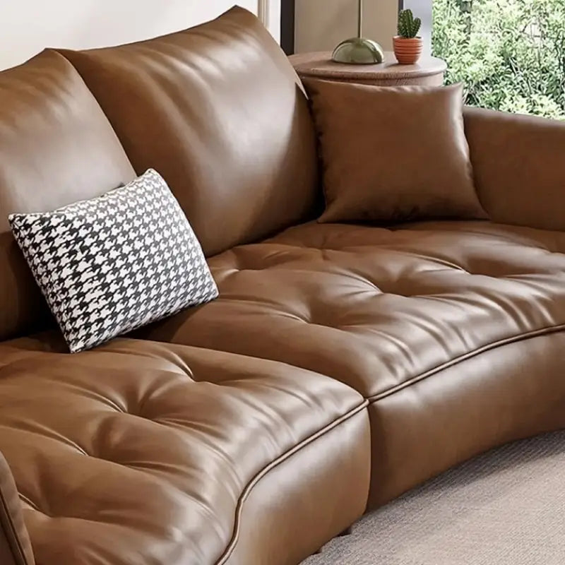 Full front view of Sablon leather sofa set with luxury sofa set aesthetics, leather couch comfort, deep tufted cushions, designer couch details, modern sofa styling and 2 seater sofa configuration