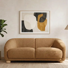 Boucle sofa with thick rounded arms and natural wooden legs, straight front view