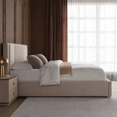 upholstered bed with headboard shown with a balanced mattress layout with soft padded headboard