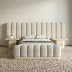 boucle bed shown in a spacious bed layout with soft textured fabric
